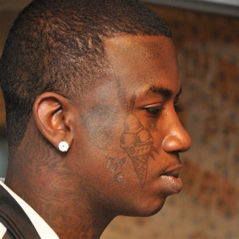 gucci fat guy tattoo on face